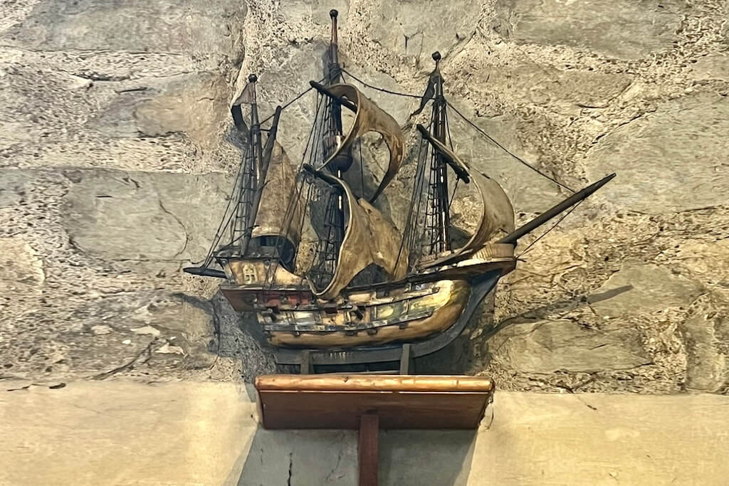 A model of a medieval ship on display on a wall at the Iberian Church in London tha you'll get to visit with Florbela on her tour.