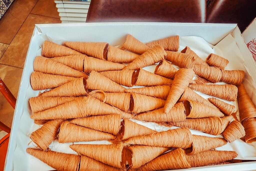 Box full of special Syrian ice cream cones used at our favourite ice cream parlour in London that you'll get to visit with us on this tour.