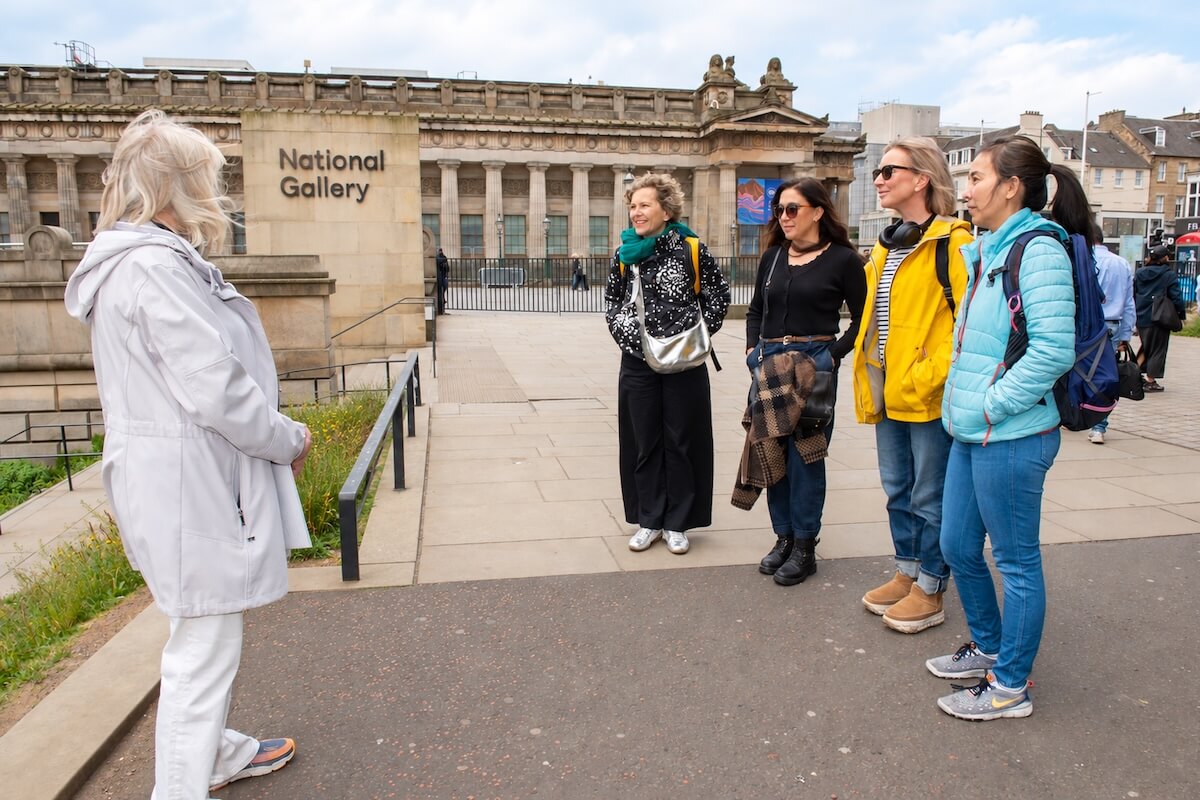 Guests on the gothic tour standing outside the Scottish National Gallery in Edinburgh