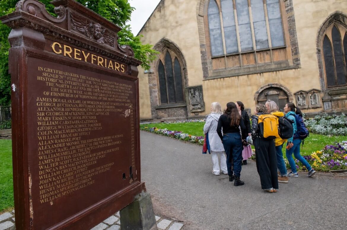 Group visiting Greyfriars Kirkyard during the Gothic Edinburgh walking tour