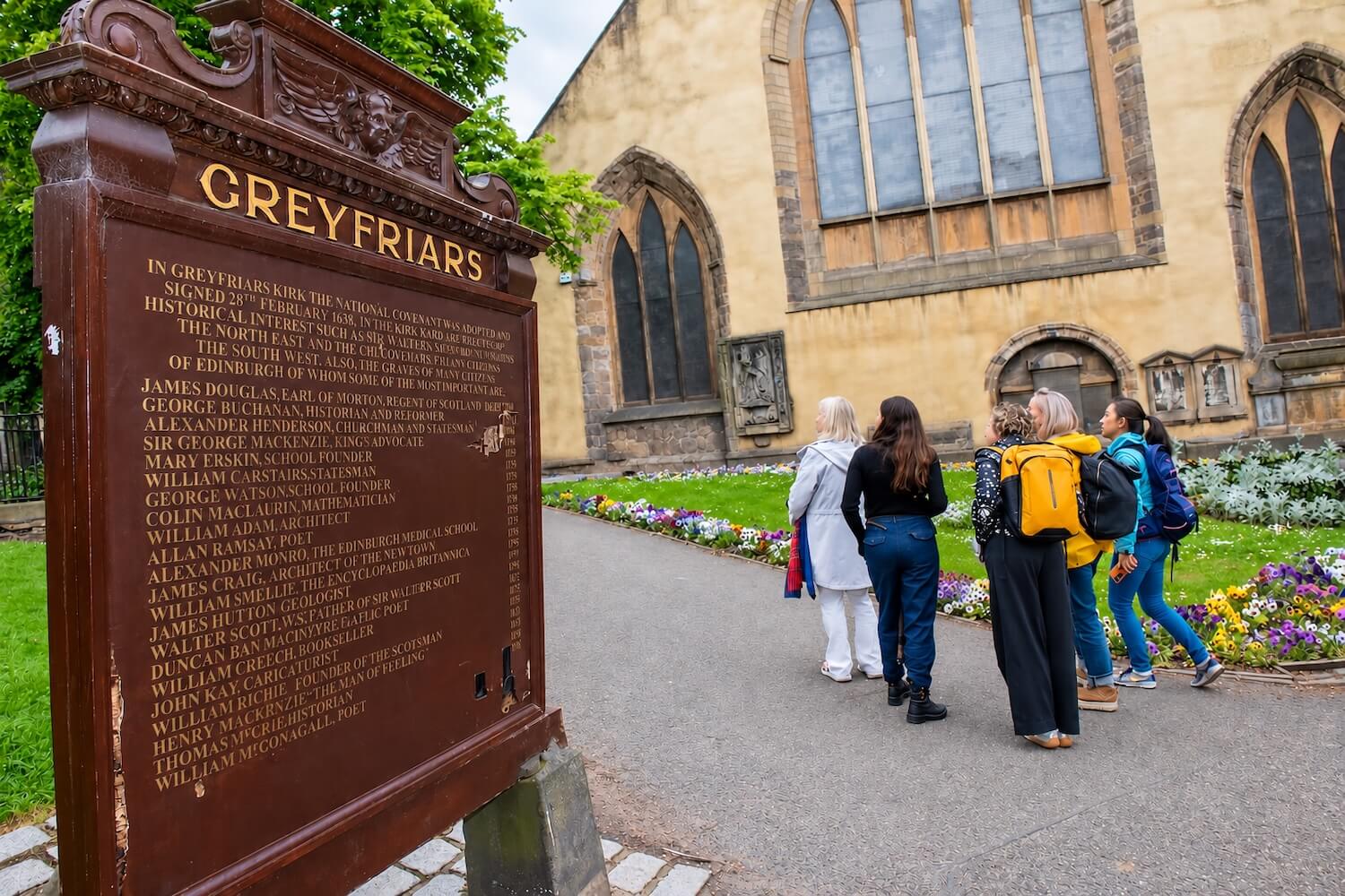 Group visiting Greyfriars Kirkyard during the Gothic Edinburgh walking tour