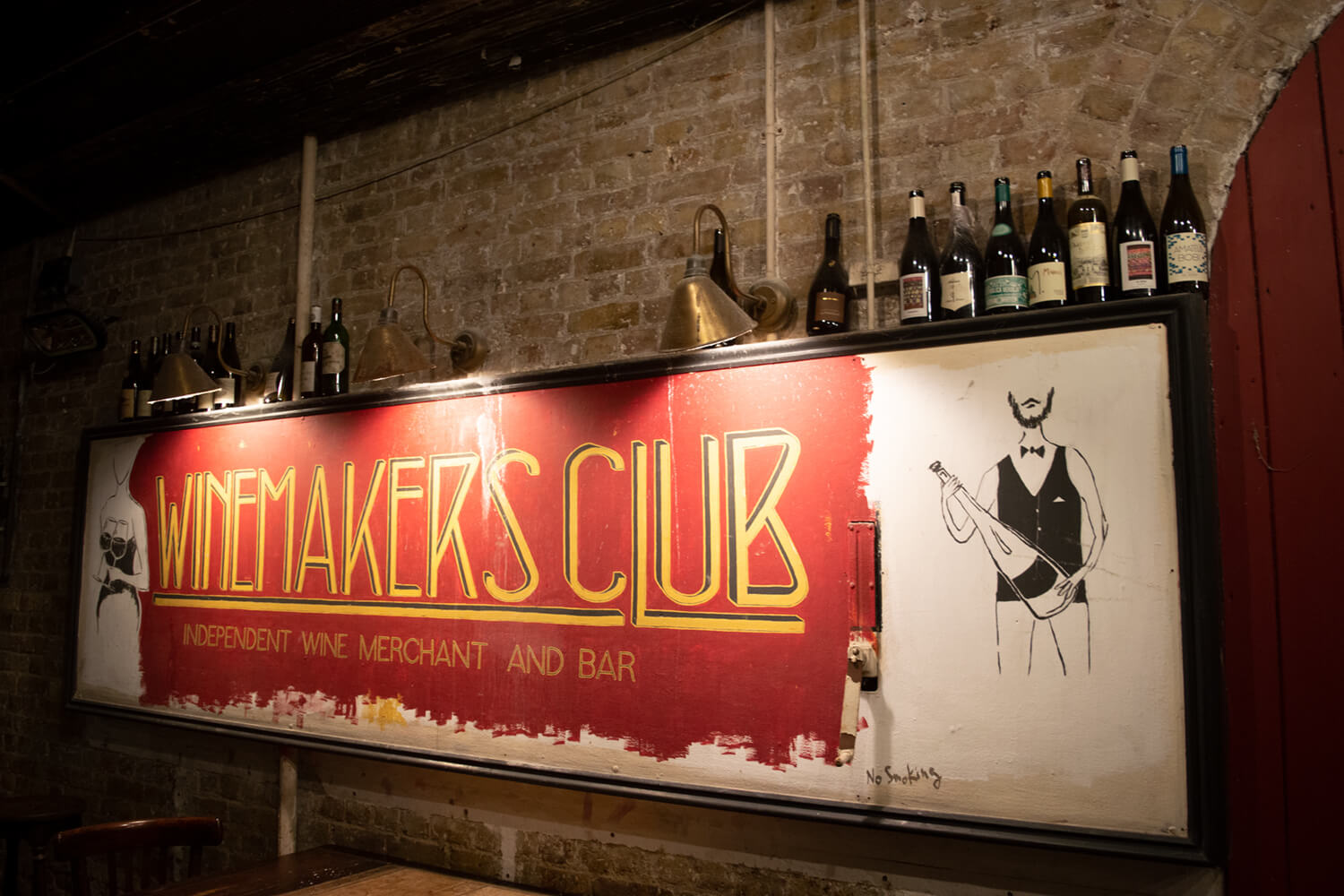 Wine bar sign at the starting point of a London food history tour inspired by migration and global flavours.