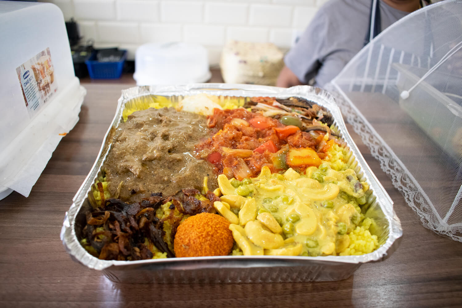 Lamprais with rice, curries and sambols served on the Sri Lankan food tour