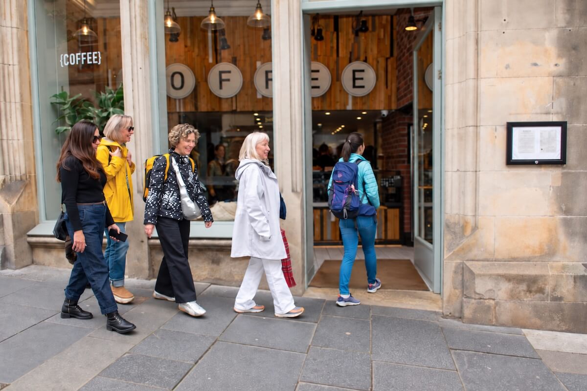 Guests entering the Edinburgh café stop for tea and scones
