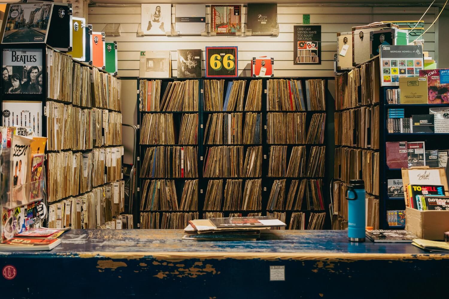 Vinyl records lining the shelves at Piccadilly Records in Manchester.