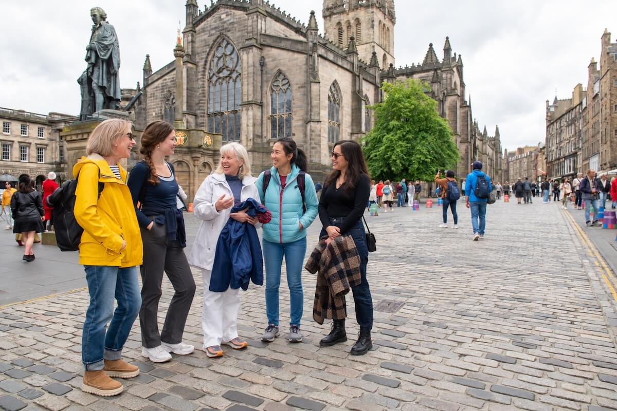 Guests speaking to each other outside St Giles’ Cathedral in Edinburgh