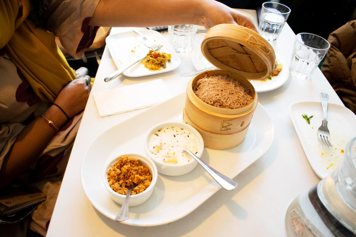 String hoppers served with sambol and coconut sothi during the tasting feast
