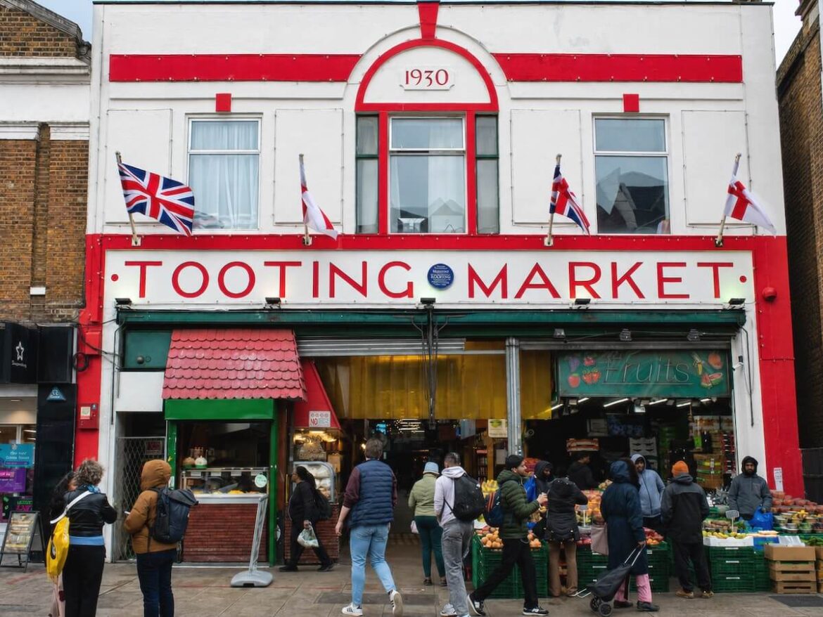 Visitors outside Tooting Market in London.